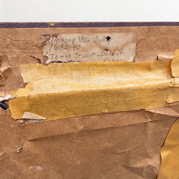 The back of the painting: brown paper backing with an old handwritten label reading Anthony Van Dyck, 1632-40, James Stuart, Duke of Richmond, partly covered by tape.