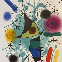 The printed image up close: the bird figure with a red-and-black eye, airbrushed pink, blue, yellow and black spots, black stars and a teal splatter ground.