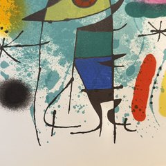 The lower part of the print: the blue and green body of the figure, a red stroke, a black airbrushed spot and fine teal splatter.