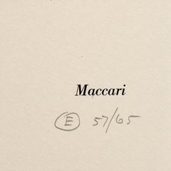 Close-up of the name Maccari printed in italic type, above a pencil circled letter E and the number 57/65 on cream paper.